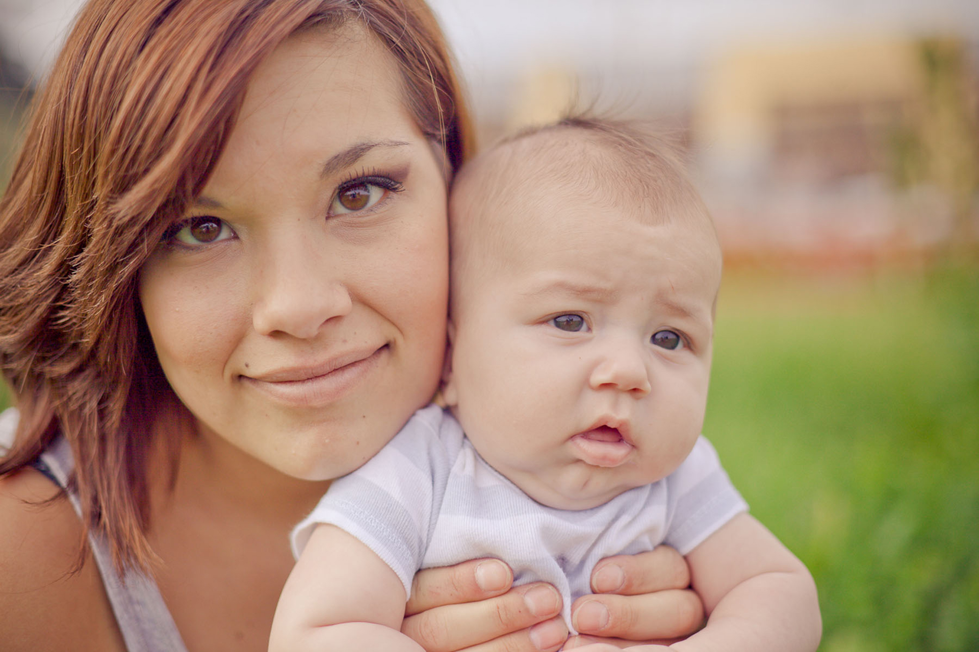 young parent program mother holding her baby