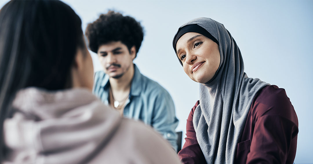 Young Adult Mindfulness Group (ping pong) adults expressing empathy in mindfulness group