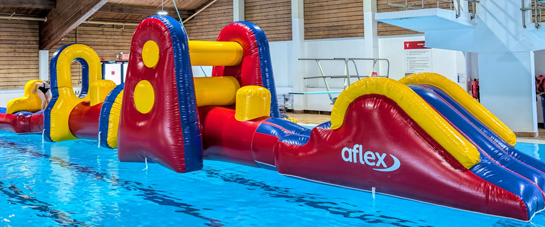 Inflatable floating obstacle course at the Kelowna Family Y