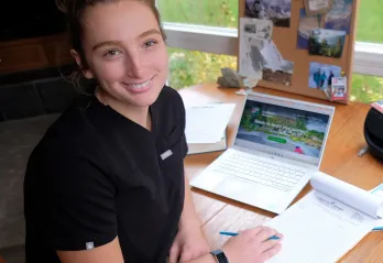 woman sitting at a desk