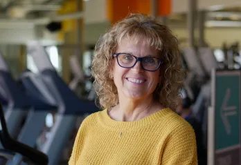woman in yellow sweater