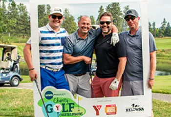 Golfers posing at the tournament