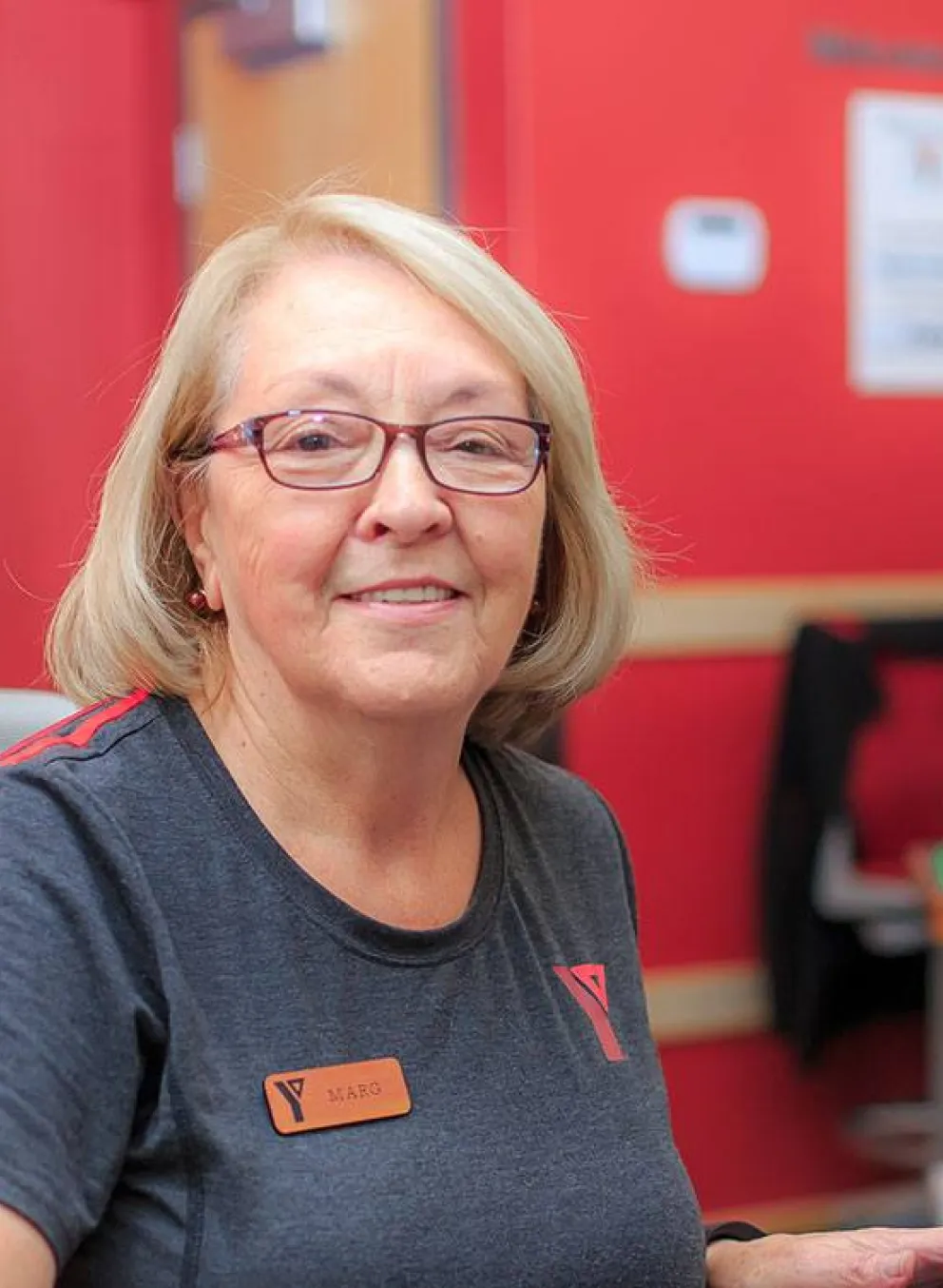 YMCA staff member at computer