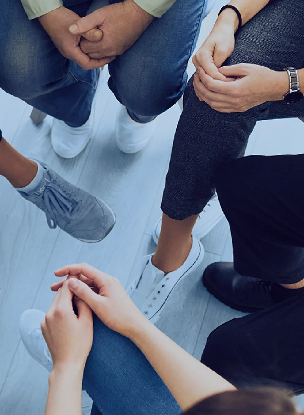 people sitting and chatting in small circle