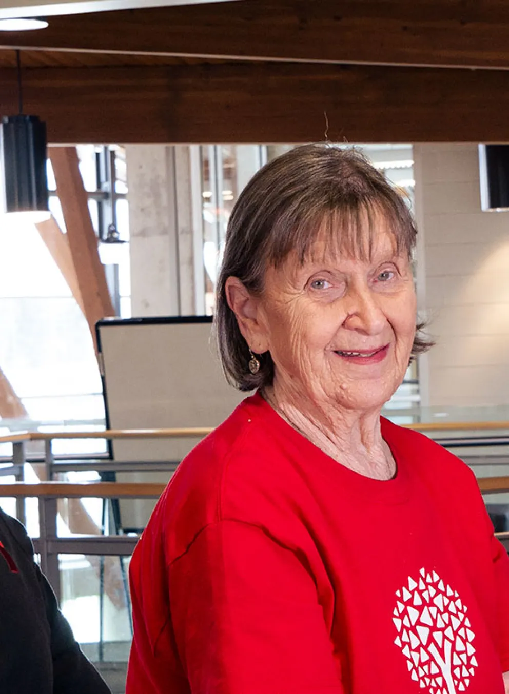 Coach and Healthy Aging participant smiling at camera