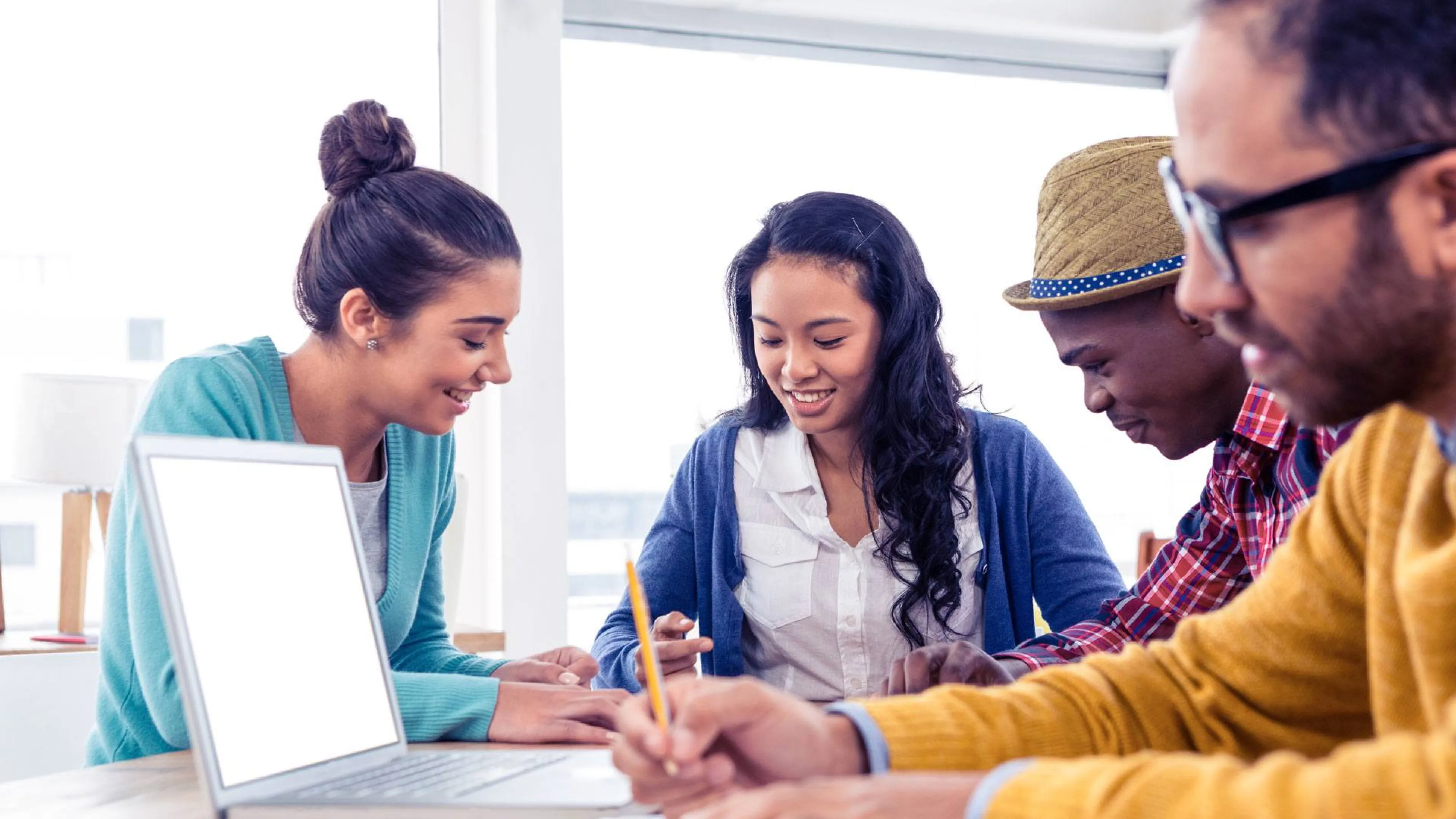 diverse group of young people learning together