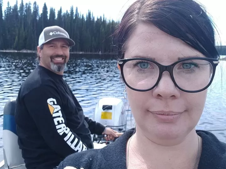 Larissa and her husband fishing