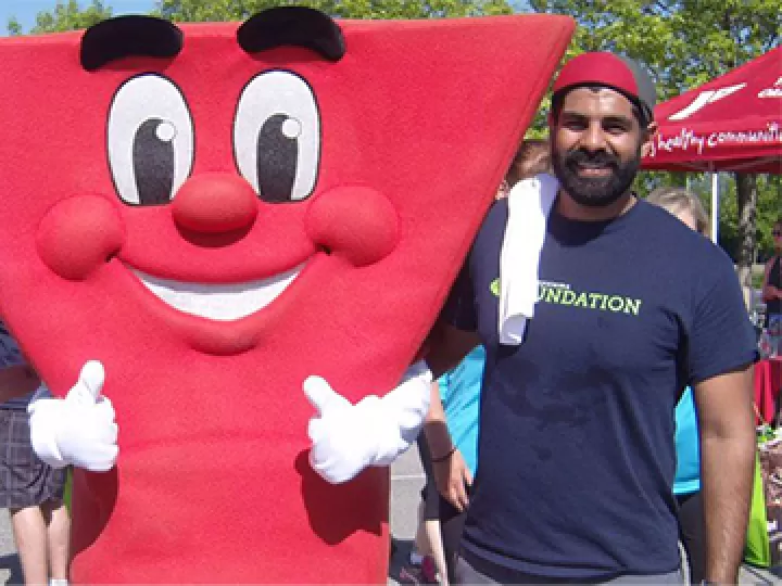 Urban Systems staff with YMCA mascot Spirit