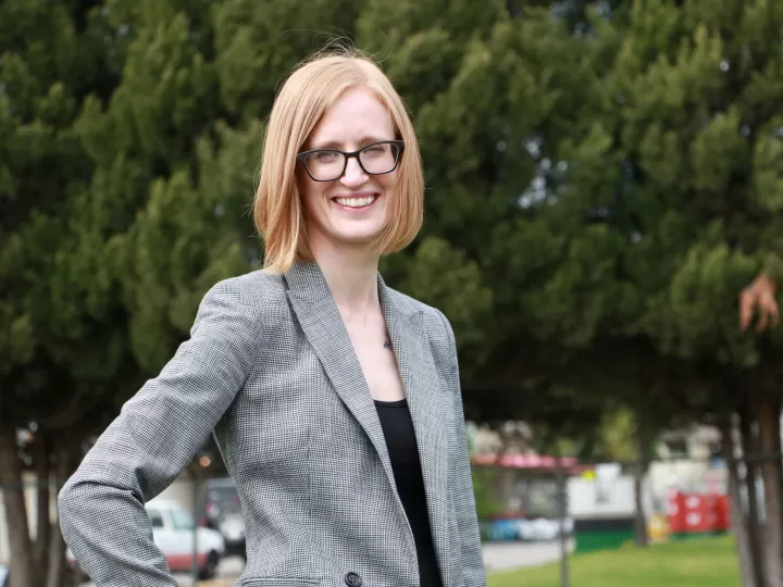 woman in grey blazer