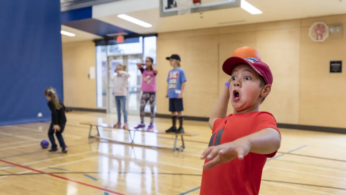 Child throwing a ball