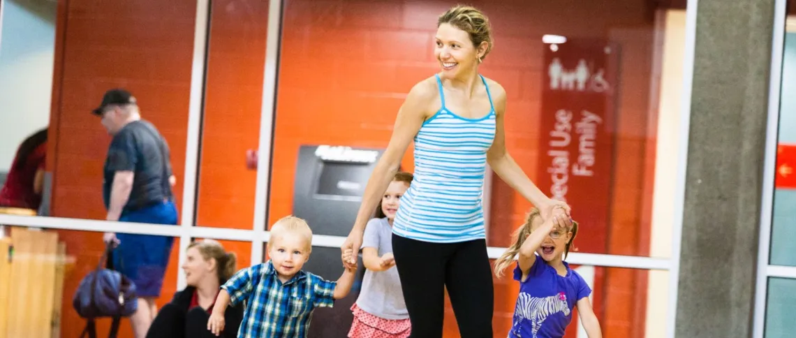 Family running and smiling