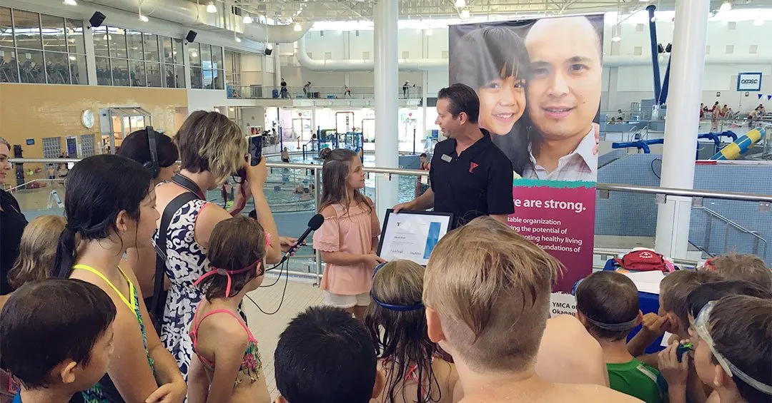 Randall Wight publicly recognizes Alexis Edall's act of heroism.