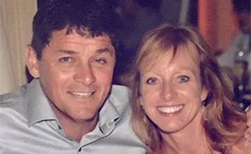 Chuck and Denise Henderson smiling