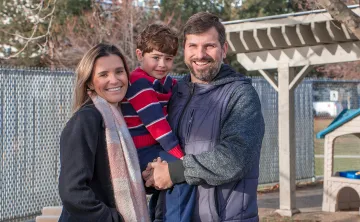Leonardo and his family smiling 