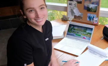 woman sitting at a desk