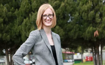 woman in grey blazer