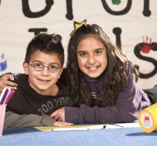 girl and boy hugging