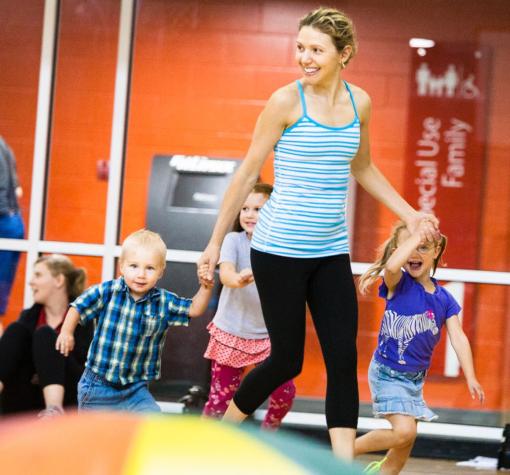 Family smiling and running
