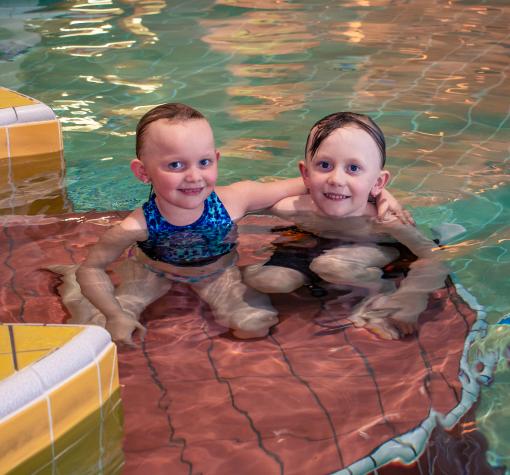 Two kids in the pool