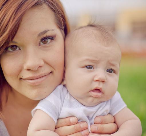 mother holding her baby