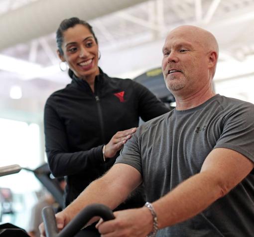 YMCA coach encourages proper shoulder position