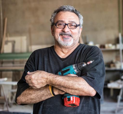 man holding a power drill