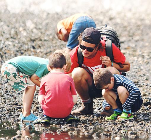 Y staff exploring nature with children